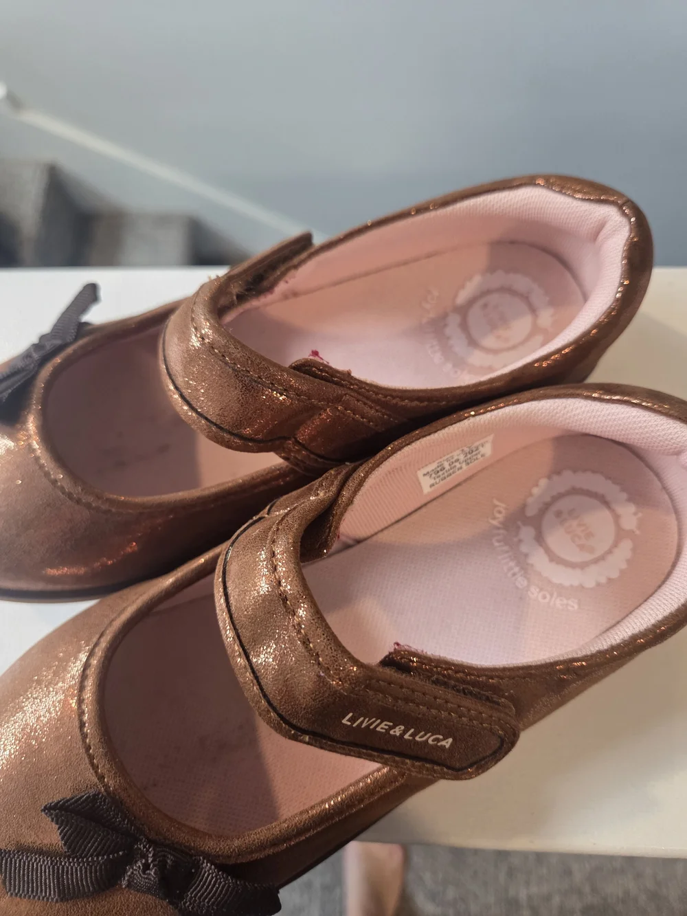 Livie & Luca Metallic Bronze Mary Jane Shoes with Black Bow